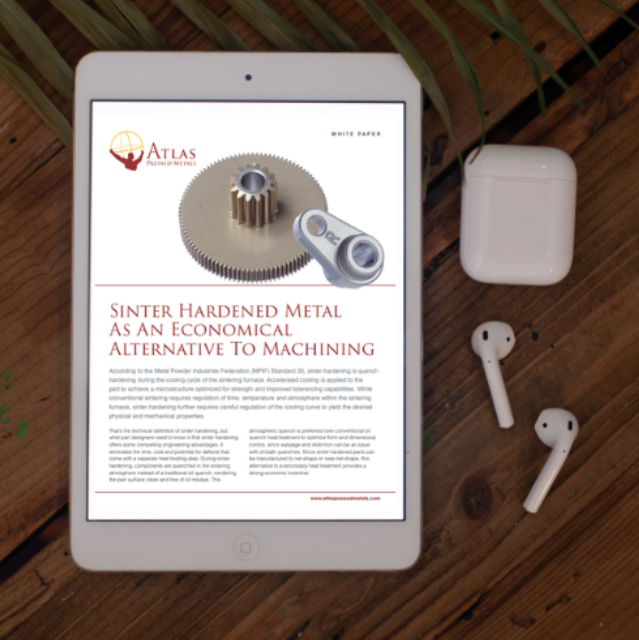 Sinter hardening whitepaper on a tablet with earbuds on a table